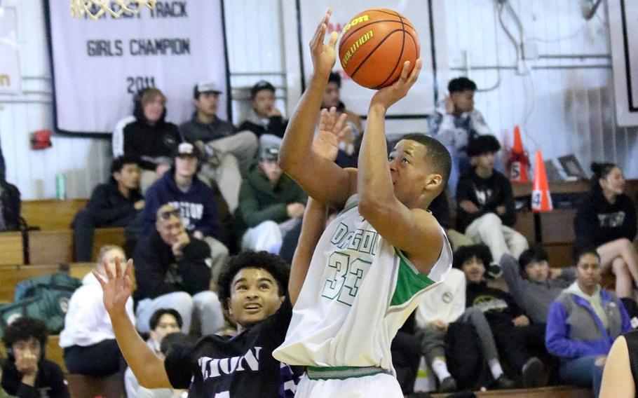 Kubasaki senior center T.J. Reese, shooting against Zion Christian in the Dragons’ 44-33 victory Tuesday, scored a career-high 39 points the night before in Kubasaki’s 59-43 win over Humphreys.