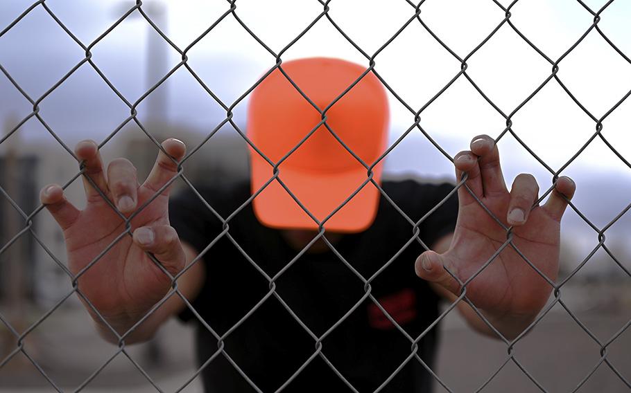 Angelo, 23, an asylum-seeker from Peru, who did not provide a last name, at a park in Commerce City, Colorado on April 19, 2023.