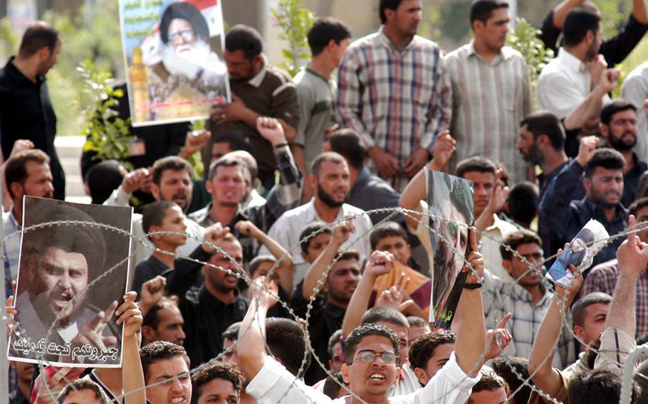 Supporters of Shiite cleric Muqtada al-Sadr protest against America in Baghdad's Furdows Square, April 4, 2004. Sadr's loyalists remain a major player in Iraqi politics.