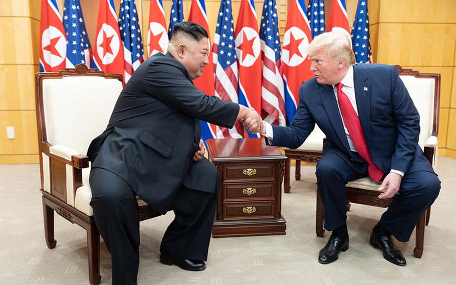 President Donald Trump and North Korean leader Kim Jong Un speak to reporters inside the Freedom House at the Demilitarized Zone, June 30, 2019.