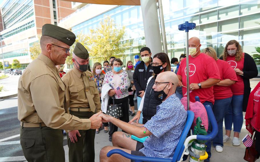Marine Corps Chief Warrant Officer Robert Domen leaves the hospital at University of Florida after receiving a double lung transplant and surviving COVID.