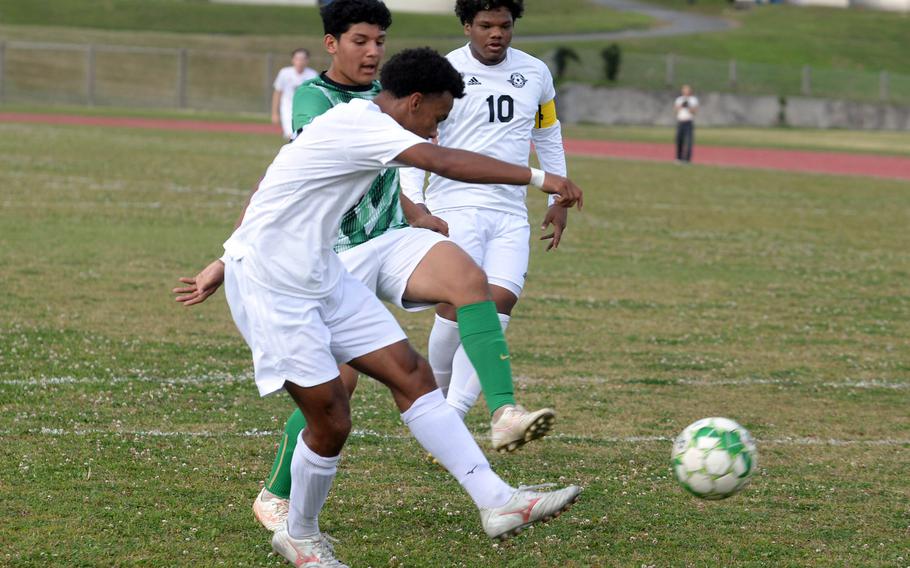 Elijah Whipp takes a shot on goal.