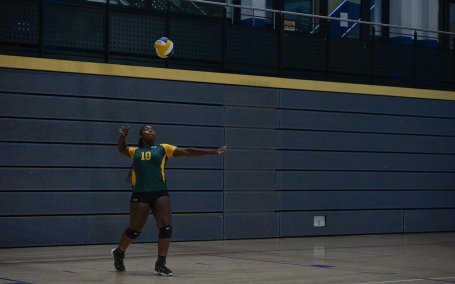 Nyla Williamson of SHAPE sets up a serve against Wiesbaden during the 2022 DODEA-”Europe Volleyball Tournament, Oct. 27, 2022, at Ramstein Air Base, Germany.