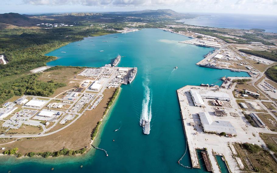 An aerial view of U.S. Naval Base Guam shows several Navy vessels moored in Apra Harbor, March 15, 2018. 