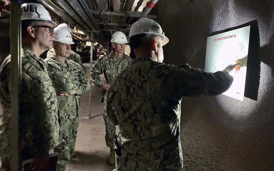 Navy officials meet to discuss water quality recovery efforts at the Red Hill fuel storage facility in Hawaii on Dec. 7, 2021. 