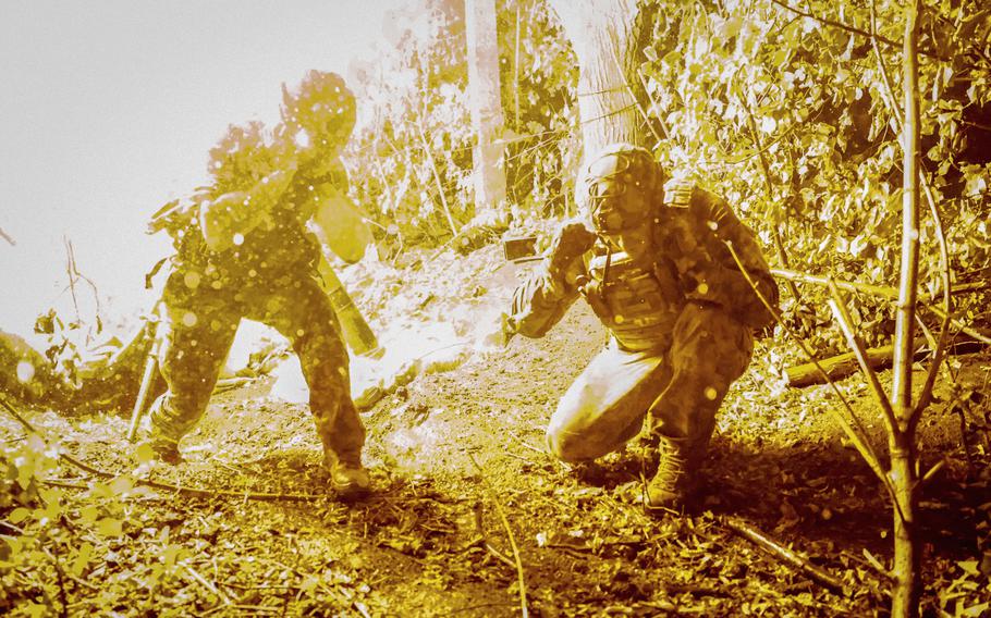 Ukrainian soldiers fire 120 mm mortar towards Russian position on the front line at Chasiv Yar in Donetsk region, Ukraine, Friday, June 21, 2024. 