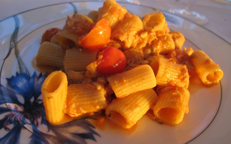 Pasta with cherry tomatoes is among the many dishes available at the restaurant at Hotel Catullo in Sirmione. 