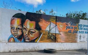A mural in the northern port city of Cap-Haïtien warns Haitians about the perils of illegal migration. 