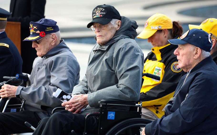 World War II veterans Harry Miller, Dixon Hemphill and George McCarthy, left to right, were among six veterans of that conflict honored during a Veterans Day ceremony at the National World War II Memorial in Washington, D.C., November 11, 2023.