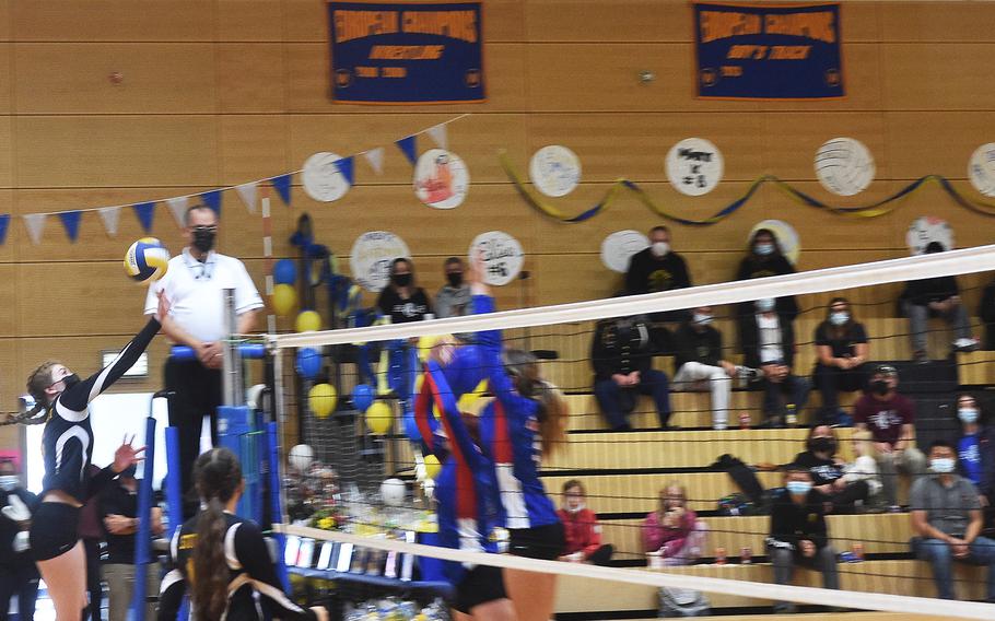 Stuttgart’s Charity Clements taps the ball over the net during the Stuttgart-Ramstein volleyball game played in Wiesbaden on Saturday, Oct. 9, 2021.