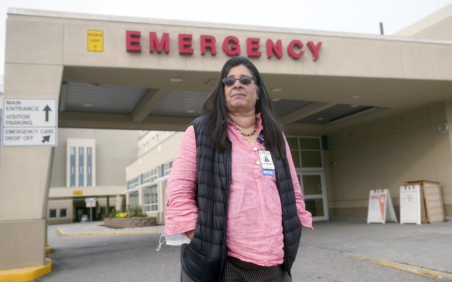 Angelique Ramirez, chief medical officer at Foundation Health Partners in Fairbanks, poses for a photograph in front of the emergency entrance at Fairbanks Memorial Hospital on Tuesday, Sept. 21, 2021, in Fairbanks, Alaska.