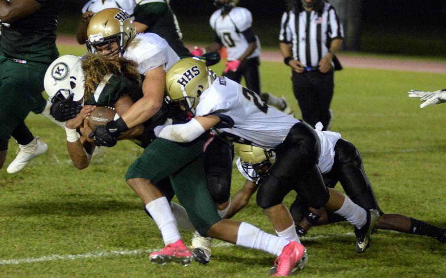 Maurice Brown tries to hang onto the ball.