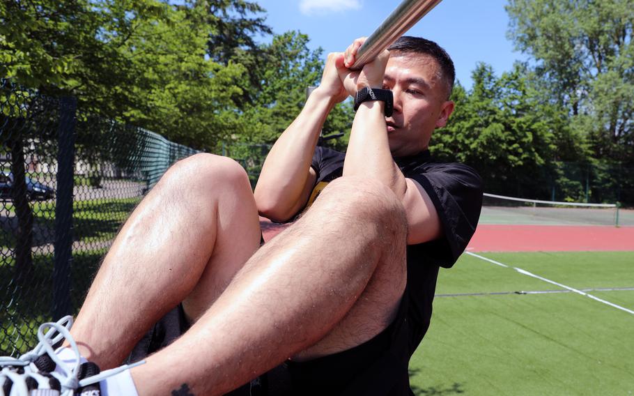 Col. Jacob Gin, the chief of human resources for Regional Health Command Europe, completes the leg tuck portion of the Army Combat Fitness Test. For 40-plus years, the U.S. Army gauged the physical fitness of its soldiers on pushups, sit-ups and a 2-mile run test. But the Army wanted a better measure of “soldier physical readiness.” And now it has it, thanks — in part — to the University of Iowa.