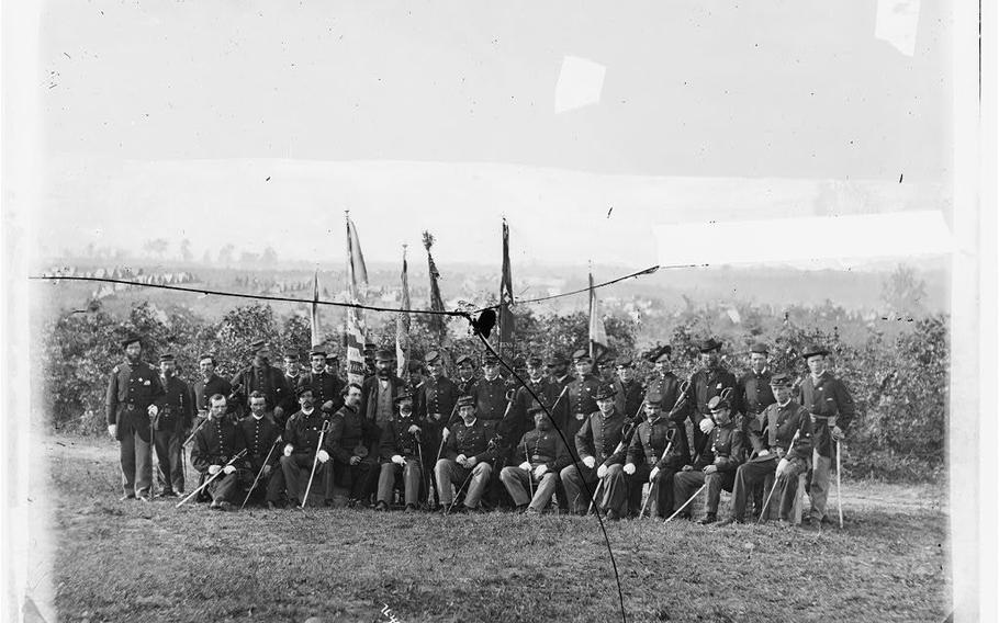 Union Army Lt. Col. James J. Smith and officers of the 69th New York Infantry (Irish Brigade) pose for a photo during the Civil War. 