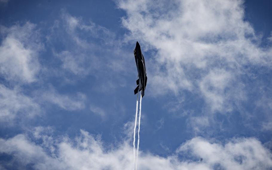 An F-35 Lightning II banks through the clouds over Ramstein Air Base in Germany on June 6, 2024. The exercise, known as "Ramstein 1v1," featured pilots from nine NATO countries engaging in friendly competition to hone their dogfighting skills.