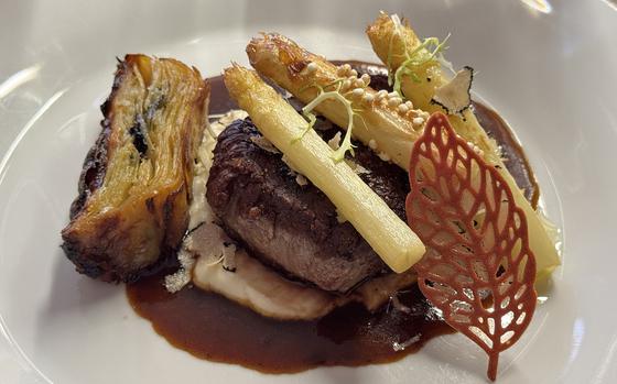 A tender steak filet with truffle, asparagus and a crisp potato side at Vicino in downtown Kaiserslautern.