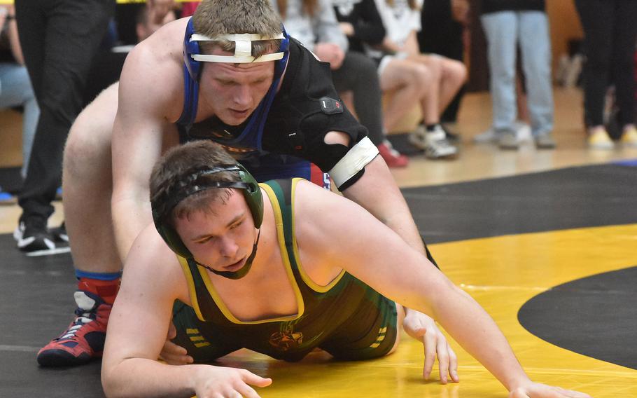 SHAPE’s William Bush was down but not out of a 215-pound semifinal match against Ramstein’s Joseph Eves on Saturday, Feb. 10, 2024 at the DODEA European Wrestling Championships. Bush went on to win the match and the championship.