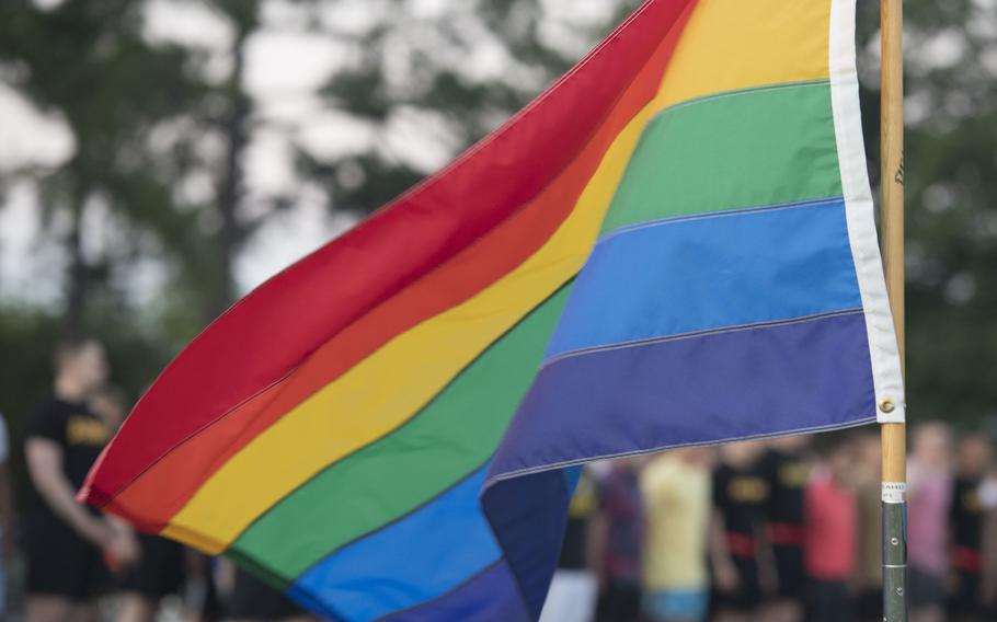 A rainbow flag waves at the starting line of a Pride Observance Month 5K run at Joint Base Langley-Eustis, Virginia, June 21, 2019. 