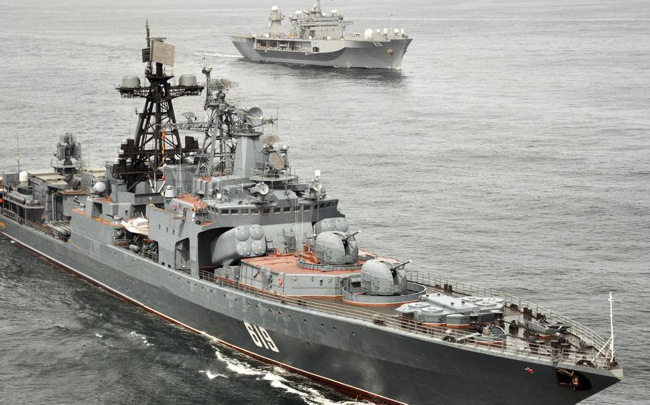 The Russian navy anti-submarine ship Severomorsk, foreground, sails with the USS Mount Whitney during a joint exercise in 2010. Relations between the Russian fleet and NATO allies deteriorated following Russia's forced annexation of Ukraine's Crimean Peninsula in 2014.
