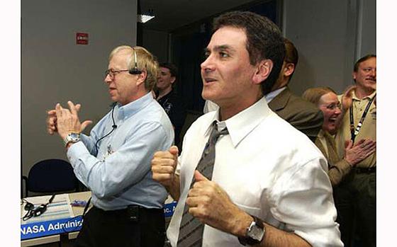 NASA official Firouz Naderi celebrates the landing of the Opportunity rover on Mars in 2004. MUST CREDIT: T. Wynne/JPL-Caltech/NASA.