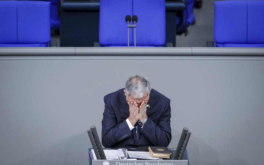 Mickey Levy, Speaker of the Knesset, reacts during the commemoration of the