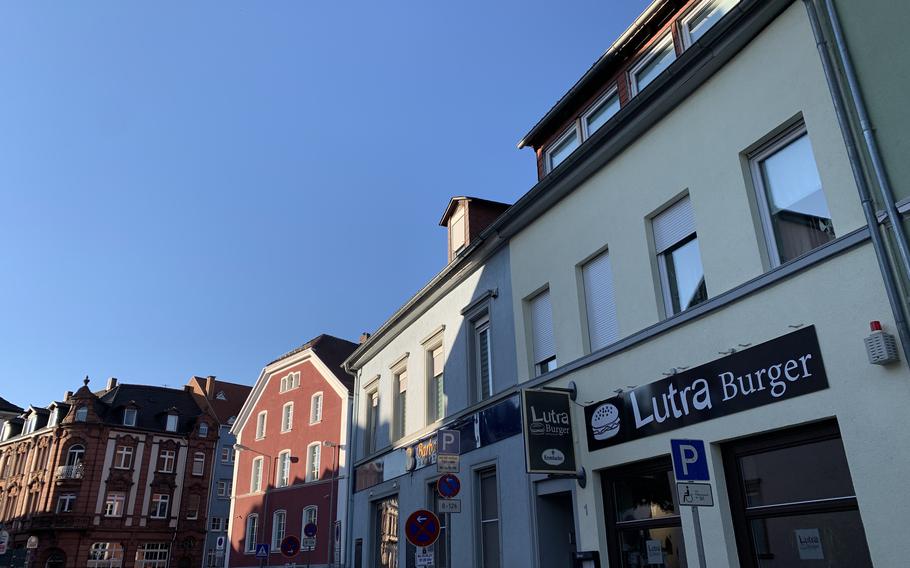 Evening shades fall on Lutra Burger June 1, 2021 in downtown Kaiserslautern. The restaurant is slightly off the beaten path of the pedestrian zone, but its golden hand-cut style fries and meaty burgers are a strong attraction.