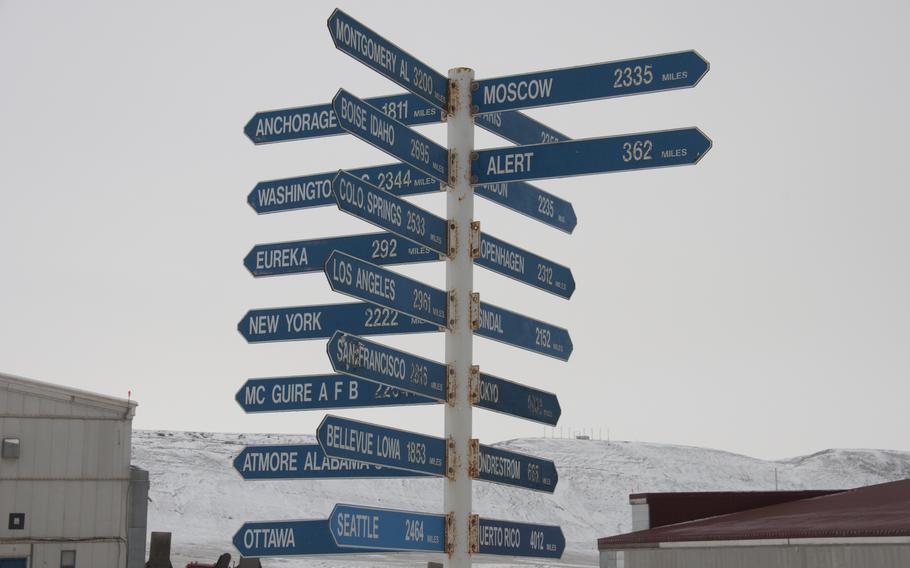 The traditional signpost on remote military bases, here at Thule, shows the base is slightly closer to Moscow than Washington.