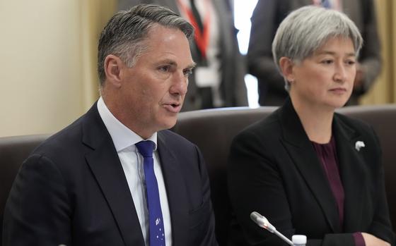 Australia's Deputy Prime Minister and Defence Minister Richard Marles, left, speaks alongside Foreign Minister Penny Wong during a meeting in Melbourne on May 1, 2024.