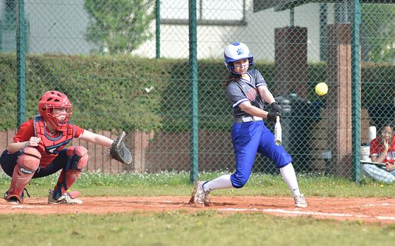 Ramstein's Aspen Lindsey connects on a grand slam during the first inning of the first game of an April 13, 2024, doubleheader against Lakenheath on Ramstein Air Base, Germany.