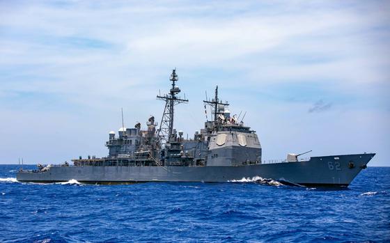 The guided-missile cruiser USS Robert Smalls steams in the Philippine Sea, June 3, 2023.