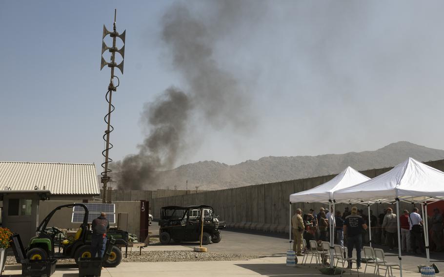 Americans burn sensitive material at a military base at Kabul’s airport on Sunday, Aug. 15, 2021. Later that day, reports came of the Taliban’s advance into Kabul’s outer areas.  