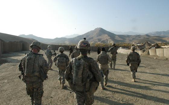 Tangi Valley, Afghanistan, Nov. 7, 2009: Soldiers with 3rd Platoon, Company A, 2nd Battalion, 87th Infantry Regiment set off from Combat Outpost Tangi en route to the site of a discovered roadside bomb. Since standing up the austere outpost in June, the soldiers have battled roadside bombs and a populace that is not ready to buy the counterinsurgency incentives that they are selling.

META TAGS: Operation Enduring Freedom; U.S. Army; IED; 