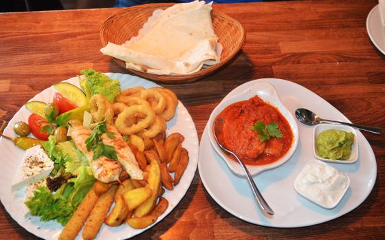 The Plato La Habana appetizer platter at Havana Restaurant in Wiesbaden, Germany, includes shrimp, calamari, chicken skewers, potato wedges, mozzarella sticks and more.