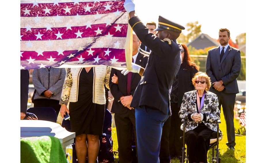 Rose Prickler and other family members attend the Saturday, Oct. 22, 2022, burial of her brother, Edward Reiter, in Northampton, Pa. Reiter was killed in action in the Korean War in 1950 but his remains went unrecovered for about a year and were not identified until earlier this year.