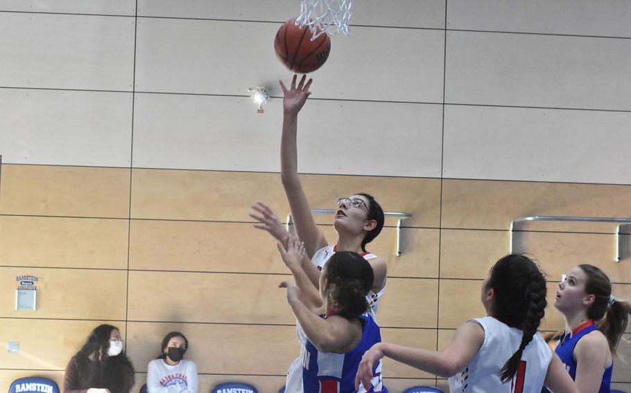 Kaiserslautern's Emma Arambula scores against Ramstein on Wednesday, Feb. 23, 2022, at the DODEA-Europe Division I basketball championships.