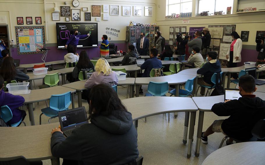 Students attend class at Olive Vista Middle School in Sylmar, Calif., on the first day back from winter break Tuesday, Jan. 11, 2022.