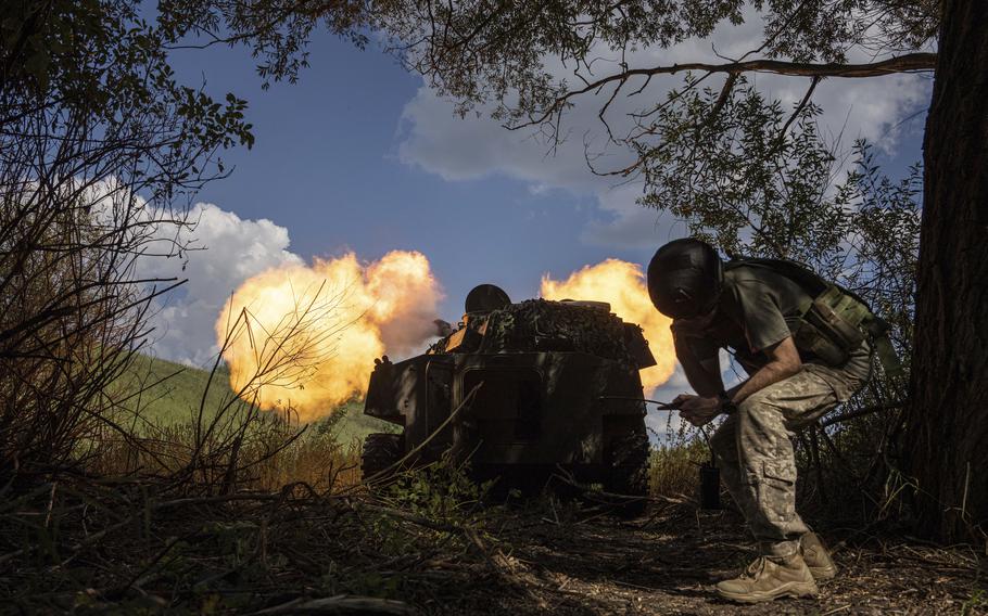 Ukrainian self-propelled artillery shoots towards Russian forces at a frontline in Kharkiv region, Ukraine, Wednesday, July 27, 2022.