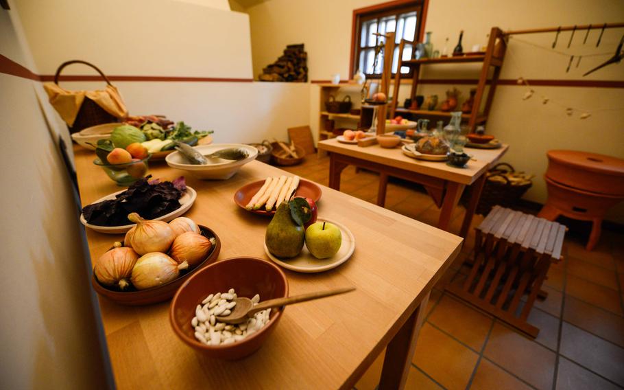 The reconstructed kitchen at Roman Villa Borg shows staple ingredients of Roman dishes. The kitchen also features authentic Roman earthenware, wooden cooking utensils and a working wood-fired oven.