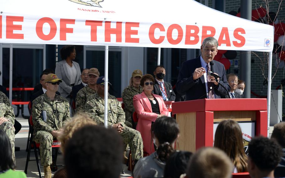 Thomas Brady, director of Department of Defense Education Activity, speaks during a ribbon-cutting ceremony for E.J. King Middle and High School at Sasebo Naval Base, Japan, Wednesday, Sept. 21, 2022. 