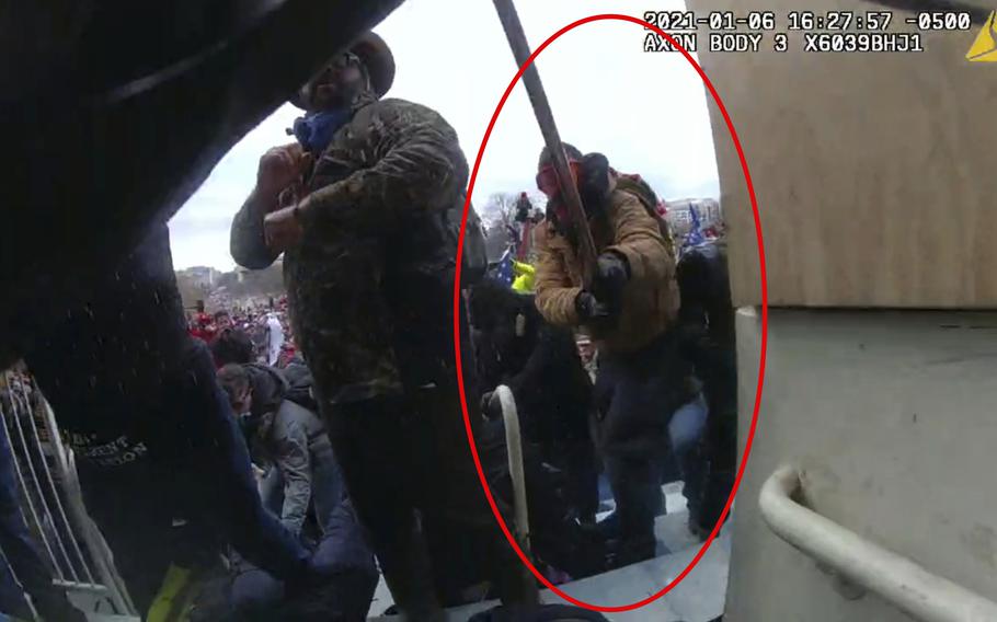 This image from police body-worn camera video, shows Scott Miller at the U.S. Capitol on Jan. 6, 2021, in Washington. 