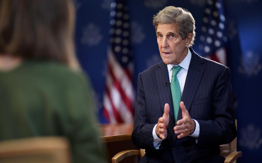 John Kerry, United States Special Presidential Envoy for Climate, speaks during an interview with The Associated Press, at the U.S. State Department in Washington.