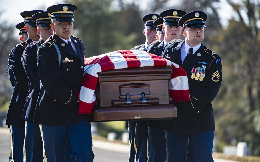 Soldiers from the 3d U.S. Infantry Regiment (The Old Guard), the U.S. Army Band, “Pershing’s Own,” and the 3d U.S. Infantry Regiment Caisson Platoon conduct military funeral honors with funeral escort for Sen. Robert Dole in Section 4 of Arlington National Cemetery, Arlington, Va., Feb. 2, 2022.