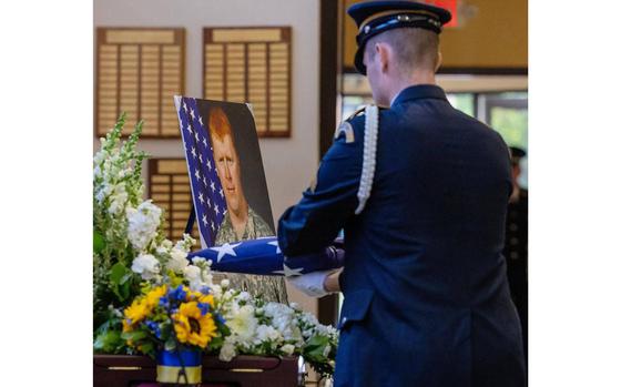 The Idaho Army National Guard Honor Guard gives a flag presentation in honor of retired U.S. military veteran Nick Maimer during his memorial service at Boise Unitarian Universalist Fellowship on Sept. 20, 2023. Maimer was killed in May in Bakhmut, Ukraine. (Sarah A. Miller/Idaho Statesman/TNS)