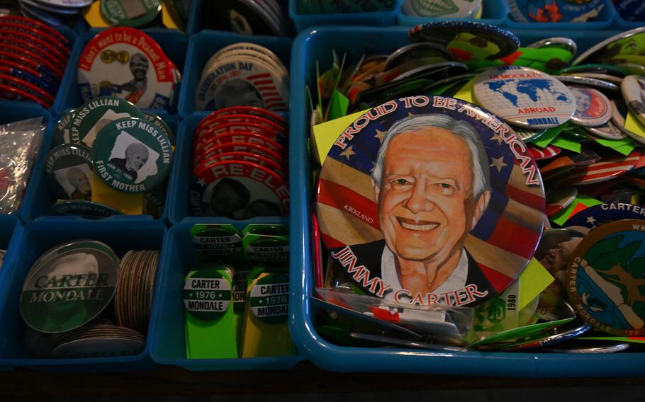 Buttons featuring former president Jimmy Carter are seen at the Plains Trading Post on Feb, 20, 2023, in Plains, Ga. 