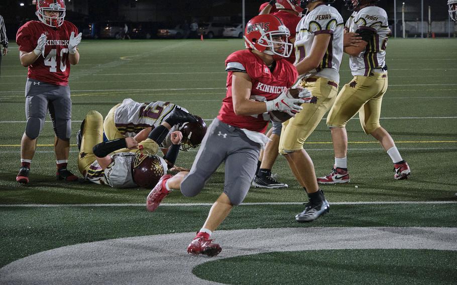 Nile C. Kinnick's Branden Euceda scores a touchdown during a game against Matthew C. Perry on Friday, Sept. 17, 2021.