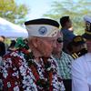 Lt. Colby Torres (right), a Chaplin at Marine Corps Base Hawaii, visits with Marine Corps Maj. John Hughes (retired) at the Ewa Battlefield Commemoration on Dec. 6, 2016. Hughes is a survivor of the attacks that took place at Ewa Field on Dec. 7, 1941.
