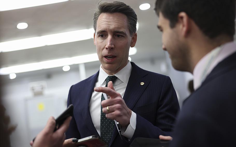 U.S. Sen. Josh Hawley, R-Mo., answers questions at the U.S. Capitol on Dec. 6, 2022, in Washington, D.C. 