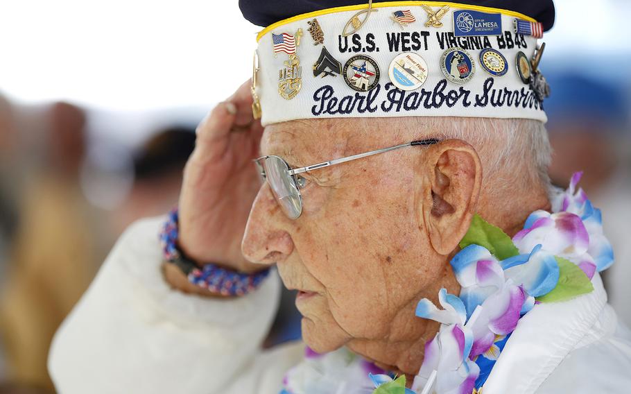 Stu Hedley salutes during the National Anthem during Balboa Park’s Veterans Museum Spirit of ’45 Day on August 14. 2016.