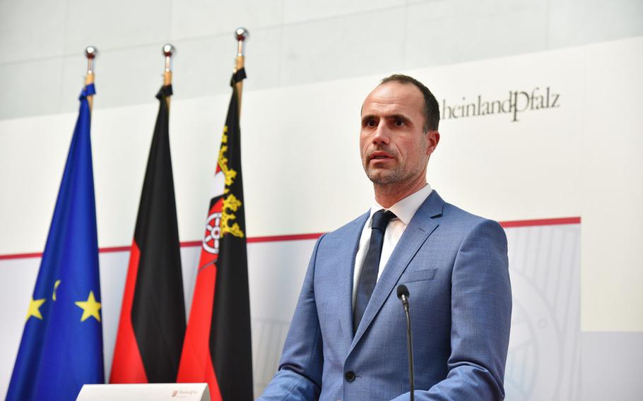 Rheinland-Pfalz Health Minister Clemens Hoch speaks at a press conference in Mainz, Germany, Nov. 2, 2021. On Monday, Hoch announced proposed measures that would sharply restrict access to businesses and public spaces for most people who have not been vaccinated against COVID-19.