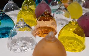 Glass objects on a white table.